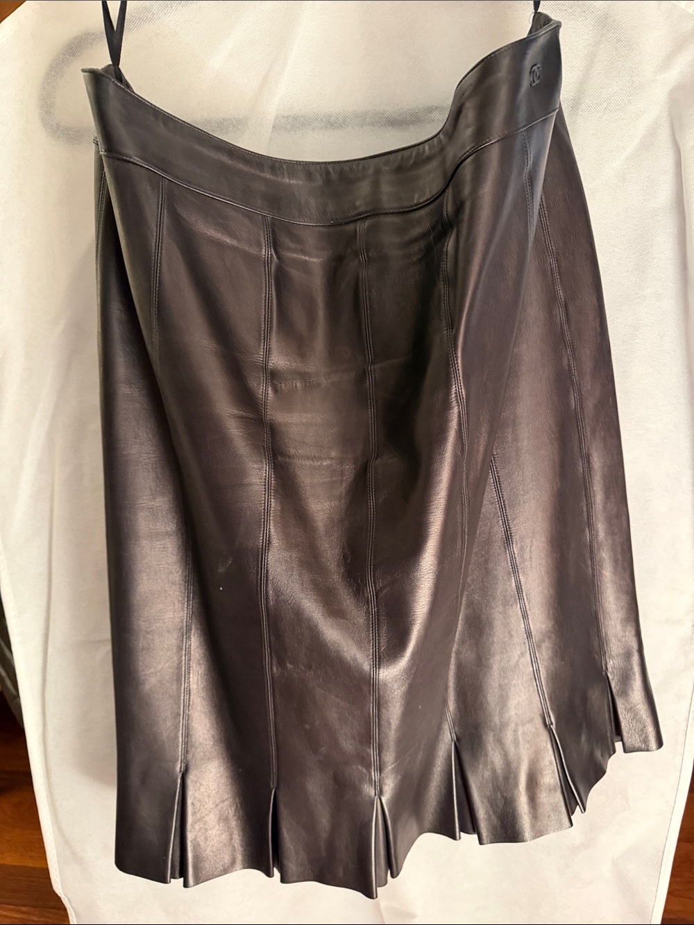CHANEL Black Leather A-Line Skirt with Pleated Hem